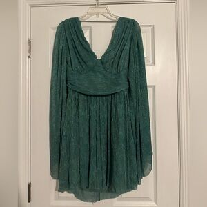Elegant Green Pleated Dress with Plunge Neckline and Open Back